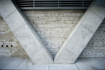 Close-up abstract view of architectural  bracing columns forming a v shape against freshly poured...