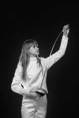 fencer. girl athlete with a rapier black and white photo