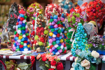 Mini Christmas Tree Table Decoration in a market. Small Pine Tree. Mini Xmas Gift.