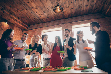 Portrait of nice attractive smart lovely cheerful cheery glad guys colleagues celebrating birthday spending festive tradition at modern industrial brick wood loft style interior office house indoors