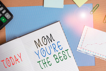 Handwriting text writing Mom You Re The Best. Conceptual photo Appreciation for your mother love feelings compliment Striped paperboard notebook cardboard office study supplies chart paper