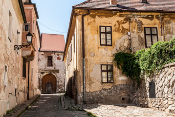 Fototapeta na wymiar Narrow Alley With Old Buildings In Typical Central European Medieval Town (Bratislava) Slovakia