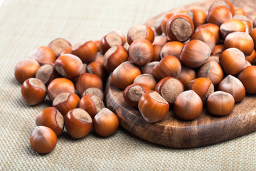close up of hazelnuts on table .