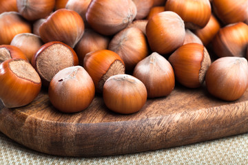 close up of hazelnuts on table .
