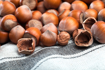 close up of hazelnuts on table .