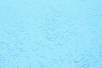 Blue light stucco, wall decoration, background backdrop texture. Rough concrete wall surface. Building wall decoration