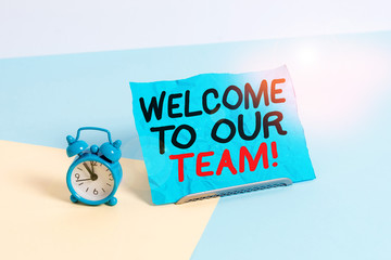 Writing note showing Welcome To Our Team. Business concept for introducing another demonstrating to...
