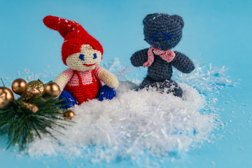 Christmas tree toys, holiday balls, white snow. Blue background. New Year. Copy space. 