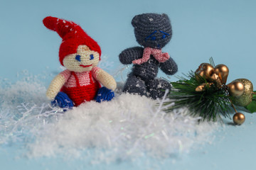 Christmas tree toys, holiday balls, white snow. Blue background. New Year. Copy space. 
