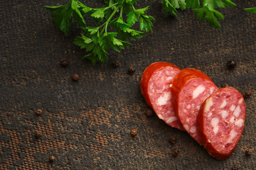 sausage slices, smoked meat product (tasty snack) menu concept. food background. top view. copy...