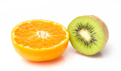 Orange mandarin and green kiwi on a white background