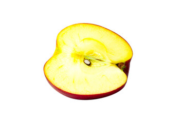 red apple cut in half on a white background