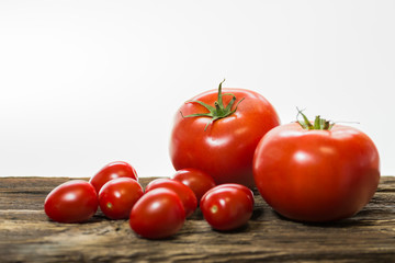 TOMATOES ON A WHITE BACKGROUND