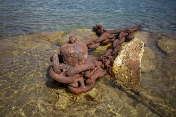 Rusty Shipping Anchor Chain on the seashore of Manoel Island Malta