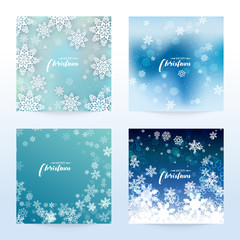 Fototapeta na wymiar New Year and Christmas card with snowflakes of blue and gray