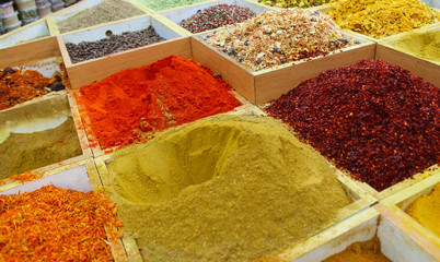 spices and herbs, Multicolored spices in a wooden organizer, top view. Seasoning background - 301395059
