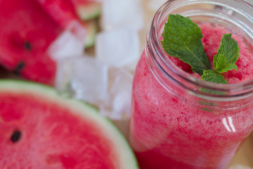 Cold watermelon juice and sliced watermelon