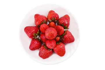 Fresh juicy strawberries isolated on a white background. Top view.