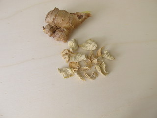 Dried ginger on a wooden board