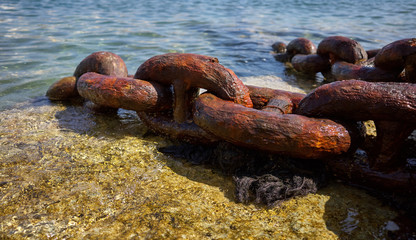 Closeup  Rusty Shipping Anchor Chain on the seashore of Manoel Island Malta 