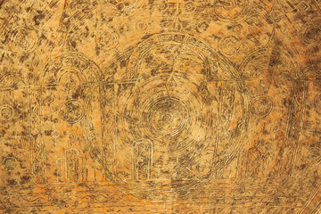 Ancient carvings and drawings on the metal