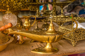 Fototapeta na wymiar Antique copper Arabic lamp. Copper utensils