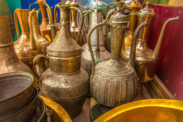 Decorative jars from the metal of the old style. Antique tableware