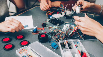 Engineering hobby. Electronic car model design. Microcontroller, wires components