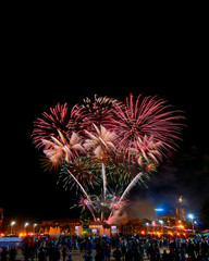 Colorful fireworks in the city. Festive fireworks.