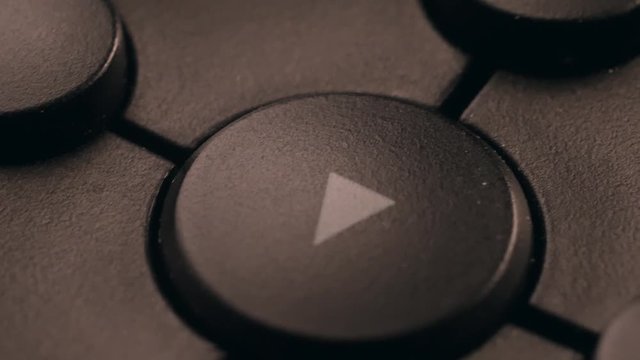 Buttons play, rewind, fast forward, stop.