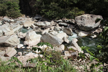 The Aguas Calientes river with stones. Peru