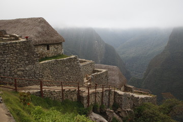 Fototapeta na wymiar The slopes of the ruins of Machu Picchu. Peru