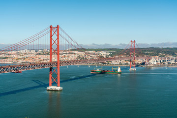 April 25 bridge with a view of Lisbon, in the summer. Portugal.