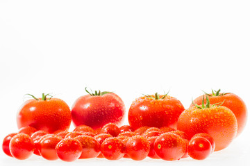 chery tomatoes on a white background with spices