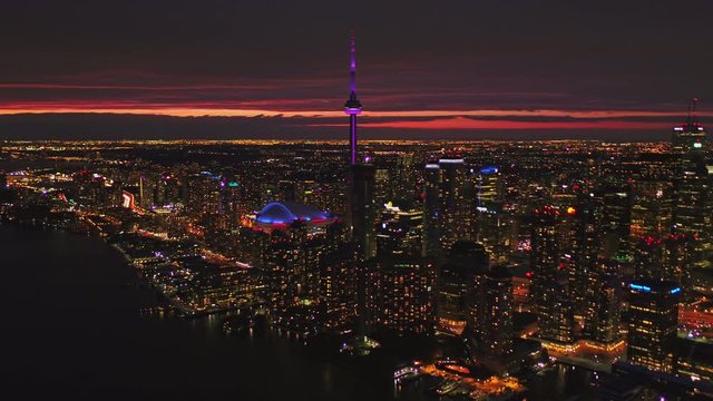 Toronto Ontario Aerial v57 Picturesque cityscape panoramic from inland to lake at sunset dusk night - October 2017