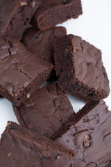 Vegan brownies chocolate plant based diet no animal products on dark background