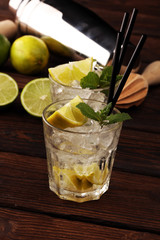 Lemon Fruit Lime Caipirinha of Brazil. Cocktail with lemon and mint