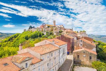 Town of Motovun in Istria, Croatia, old traditional houses and castle, view from drone