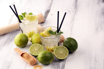 Lemon Fruit Lime Caipirinha of Brazil. Cocktail with lemon and mint