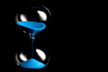 blue retro hourglass to measure time