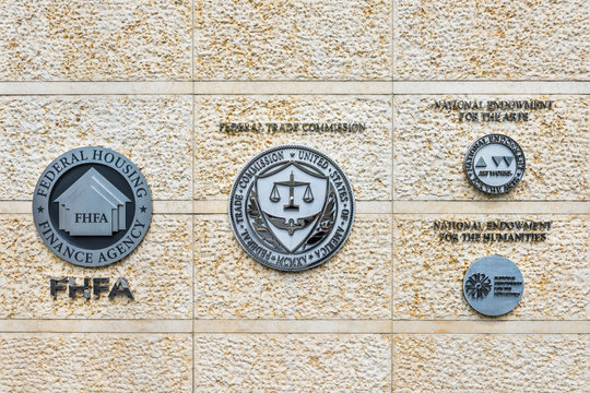 Washington DC, USA - July 3, 2017: Federal Trade Commission and Housing Finance Agency seals in downtown with closeup of sign and logo