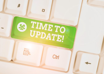 Handwriting text Time To Update. Conceptual photo act updating something someone or updated version program White pc keyboard with empty note paper above white background key copy space