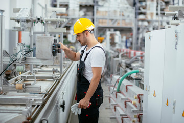 Portrait of man working in factory	