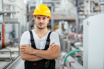 Portrait of factory worker in uniform