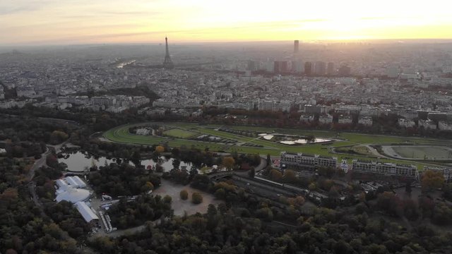 Aerial view of Paris skyline with Eiffel Tower from the Boulogne Forest at rising morning sun