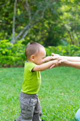 Happy Toddler Boy Learning to Walk