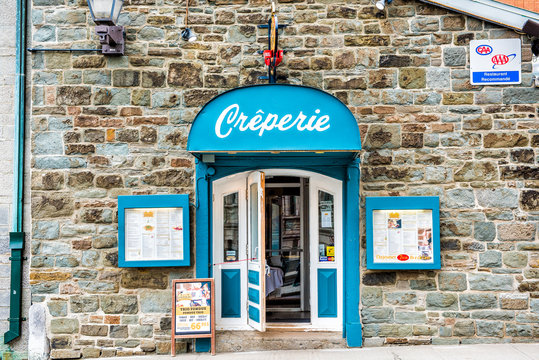 Quebec City, Canada - May 29, 2017: Creperie restaurant building in upper old town with menu and blue decoration
