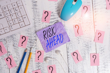 Writing note showing Risk Ahead. Business concept for A probability or threat of damage, injury,...