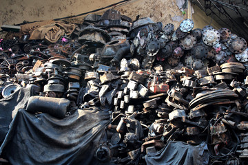 A pile of rusty old car parts
