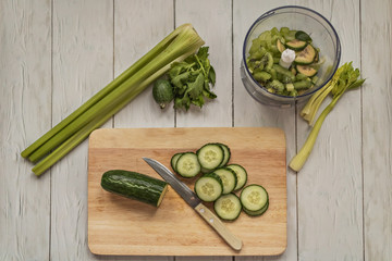 The process of making a vitamin smoothie from fruits and vegetables. Proper and wholesome nutrition. Diet.